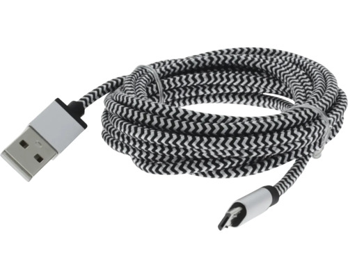 Câble de recharge USB avec gaine textile tressée, connecteur USB-A vers USB-C, motif zigzag noir et blanc.