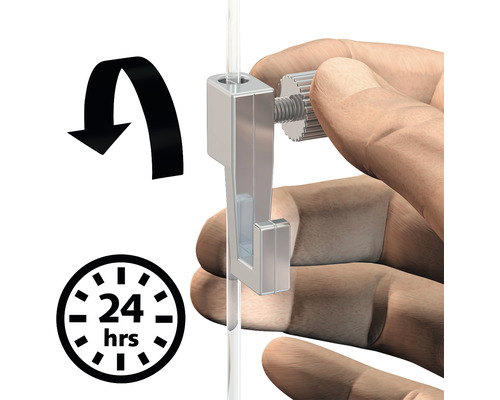 Gros plan d''un système d''accrochage de tableaux avec flèche de rotation et symbole 24 heures