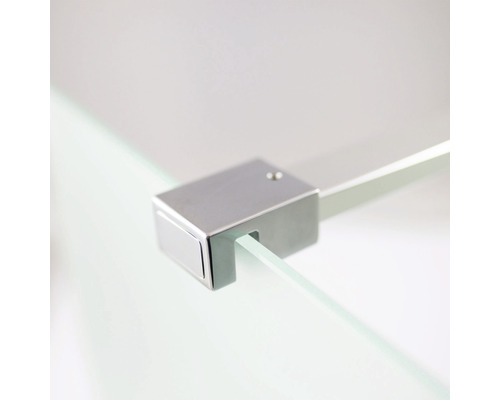 Gros plan d''un élément en verre avec un élément de fixation