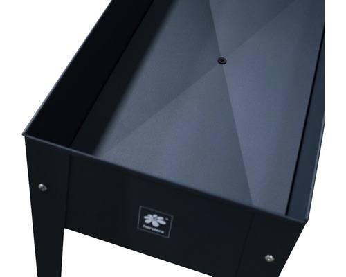 Jardinière surélevée en métal avec trou de drainage et logo du fabricant