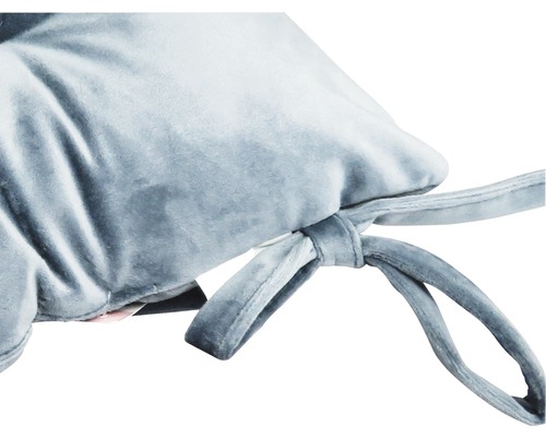 Gros plan d''un coussin de siège avec des rubans à nouer pour la fixation