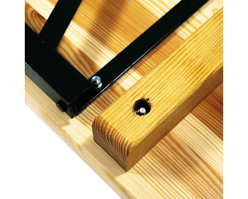 Vue détaillée du plateau de table en bois avec cadre métallique