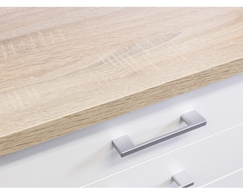 Gros plan d''une commode avec tiroirs et plateau en bois