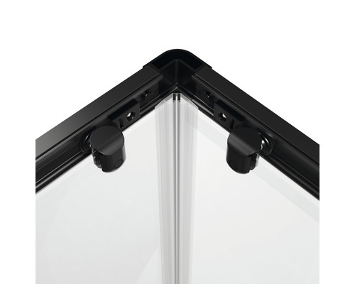 Gros plan d''une cabine de douche avec cadre noir et verre transparent