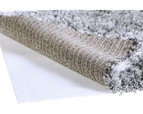 Teppich mit hochflorigem Flor und gewebter Rückseite