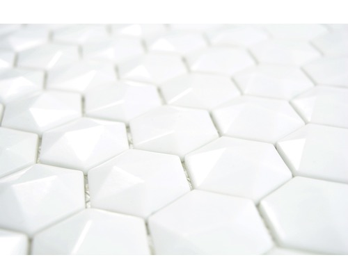 Gros plan de carreaux de mosaïque hexagonaux blancs