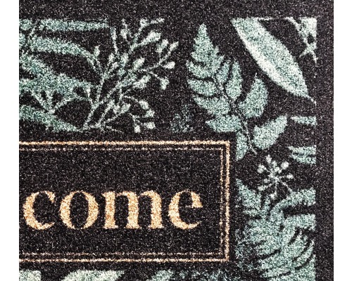 Paillasson avec motif de plantes et message de bienvenue