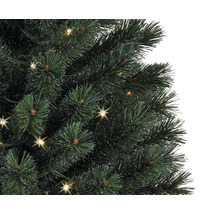 Gros plan sur un arbre de Noël décoré de lumières.