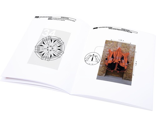 Aufgeschlagenes Handbuch mit Montageanleitung für Sicherheitsjacken