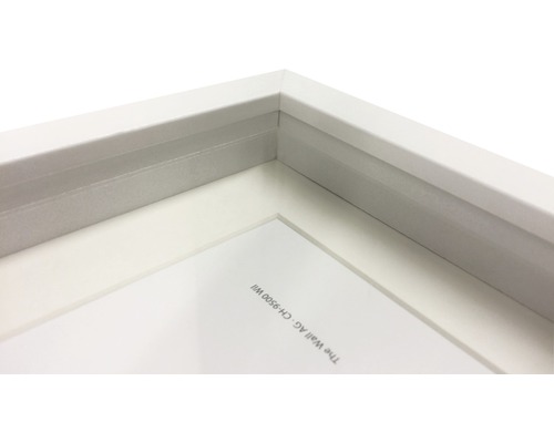 Vue détaillée d''un cadre photo blanc.