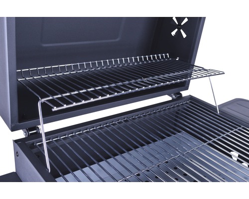 Detailansicht des Grillinnenraums mit Grillrost und Warmhalterost.