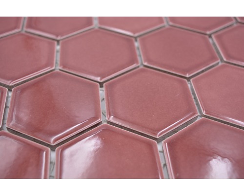 Gros plan de carreaux de céramique hexagonaux roses