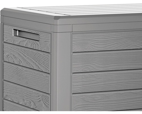 Detailansicht einer grauen Aufbewahrungsbox mit Holzoptik und Griff