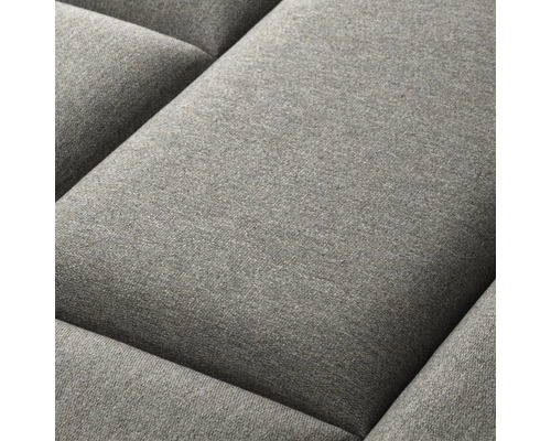 Nahaufnahme eines grauen Sofapolsters.