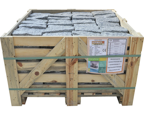 Pavés en granit dans une caisse en bois