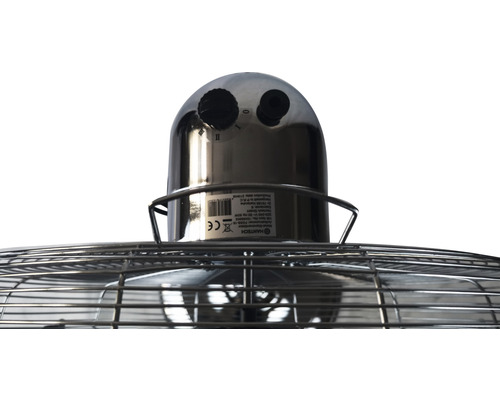 Vue détaillée d''un ventilateur avec commandes et grille de protection.