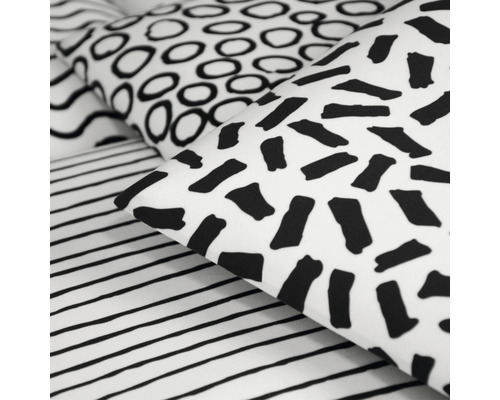 Linge de lit avec différents motifs géométriques