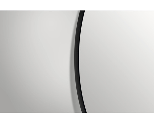 Vue détaillée d''un miroir rond avec un cadre fin