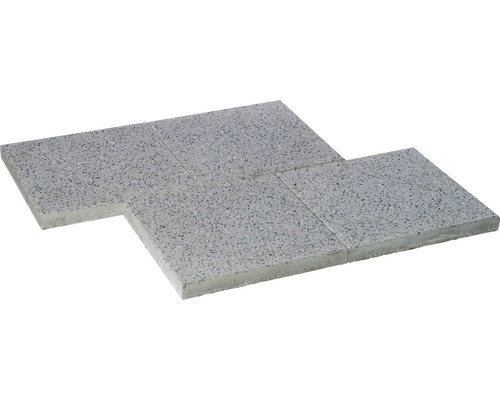 Plusieurs dalles de trottoir grises en pierre