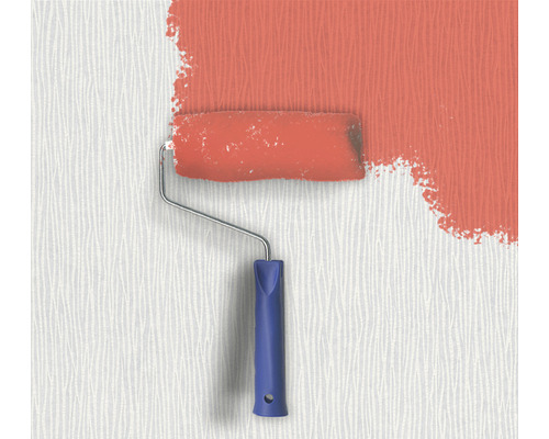 Rouleau à peinture en train de peindre un mur