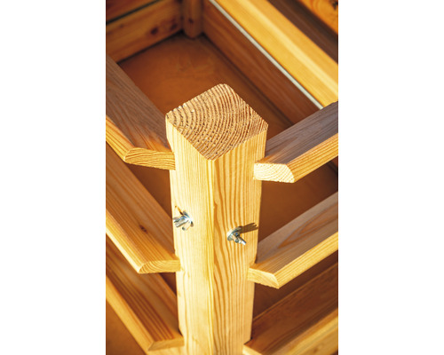 Gros plan d''une construction en bois avec des écrous à oreilles