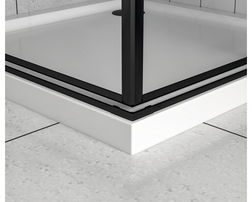 Vue détaillée d''une cabine de douche avec cadre noir et receveur blanc