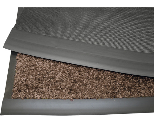 Gros plan de tapis de propreté avec bordure en caoutchouc