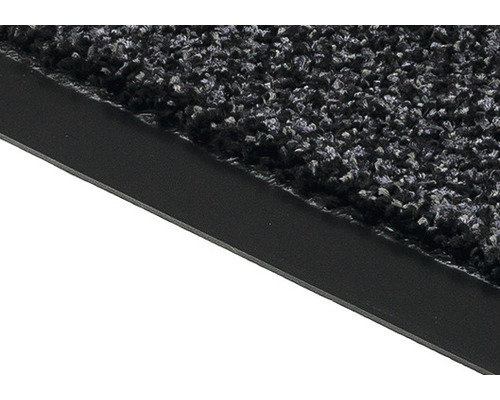 Detailaufnahme einer Fußmatte mit Textiloberfläche und Gummirand