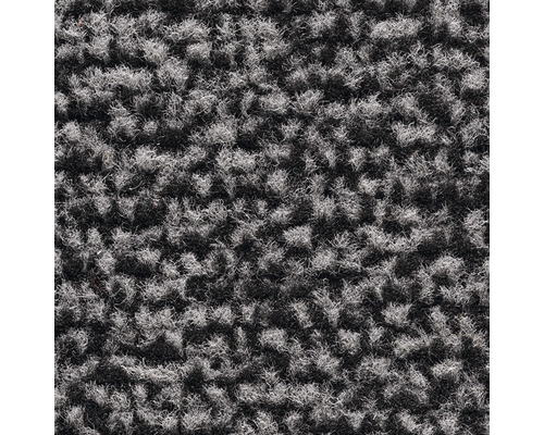 Gros plan d''un tapis gris avec une structure à picots