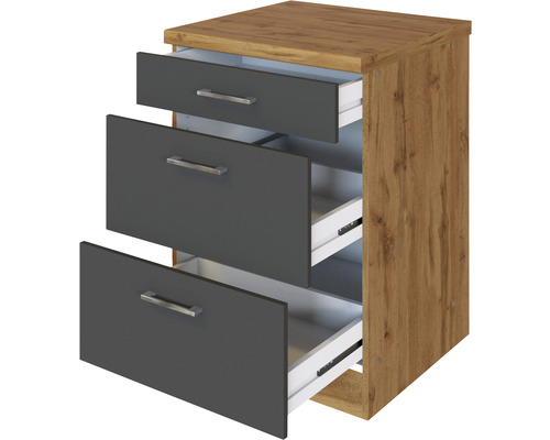 Table de chevet avec trois tiroirs ouverts