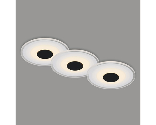 Trois plafonniers ronds avec éclairage LED.