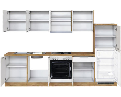 Cuisine complète avec évier, cuisinière, four, réfrigérateur et armoires