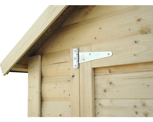 Vue détaillée d''une cabane en bois avec une charnière en T sur la porte