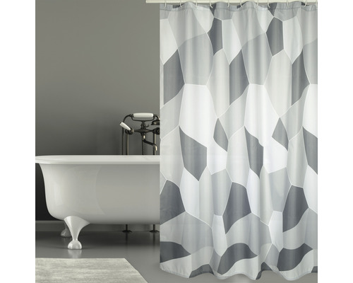 Scène de salle de bain avec baignoire et rideau de douche gris et blanc à motif géométrique