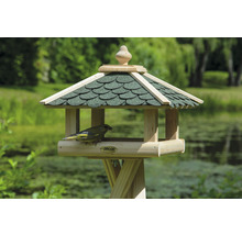 Mangeoire en bois avec toit vert et oiseau