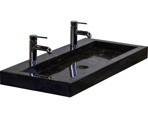 Vasque à poser noire en pierre avec deux robinets