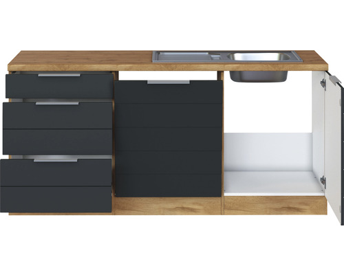 Cuisine avec évier, tiroirs et porte de placard