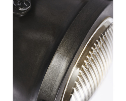 Gros plan d'une lampe grise avec verre transparent