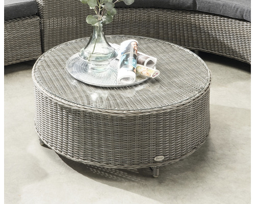 Table de jardin ronde avec plateau en verre et aspect rotin