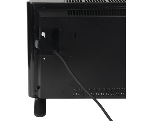 Arrière d''un radiateur avec câble, thermostat et fentes d''aération