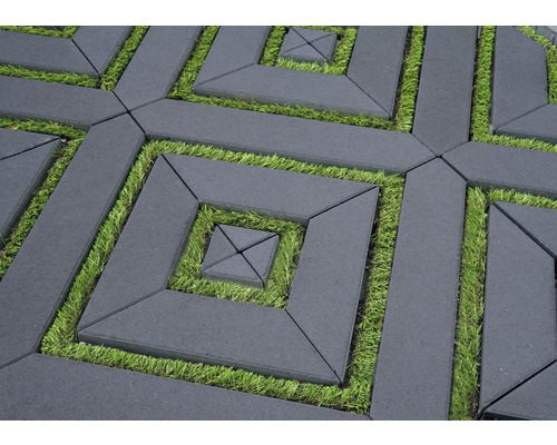 Motif de pavés posés avec des zones gazonnées
