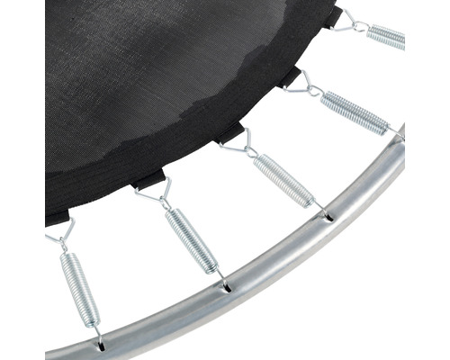 Vue détaillée d''un trampoline avec ressorts, toile de saut et cadre