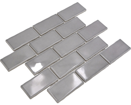 Carreaux rectangulaires brillants posés en quinconce