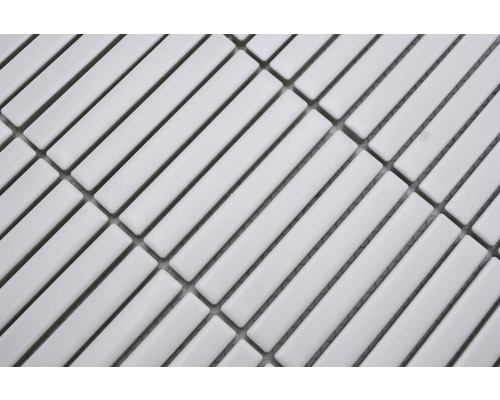 Gros plan de carreaux de mosaïque en forme de bâtonnets