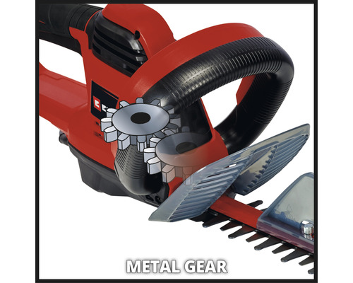 Vue détaillée des engrenages métalliques d''un taille-haie