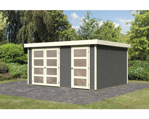 Abri de jardin avec double porte et porte simple dans le jardin