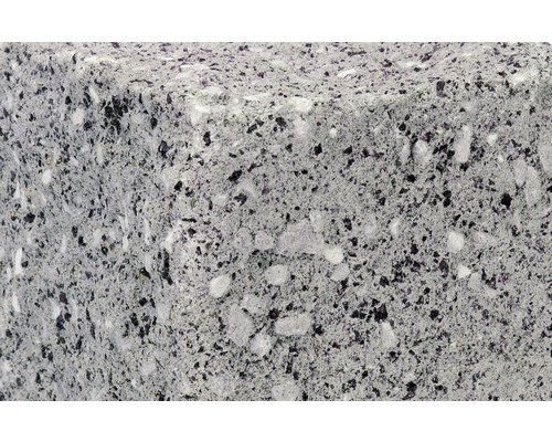 Gros plan d''un pavé en béton avec une finition mouchetée