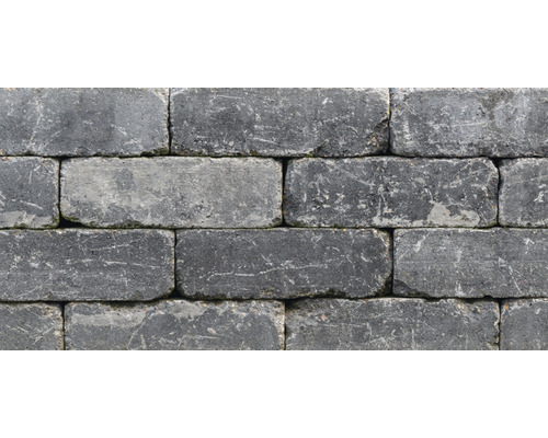 Nahaufnahme einer Mauer aus Betonpflastersteinen