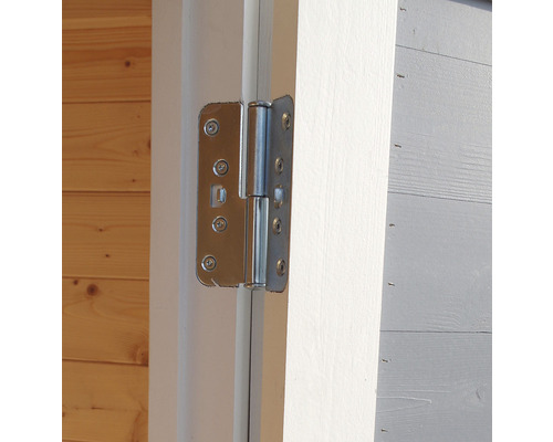 Gros plan d''une charnière de porte sur une porte en bois