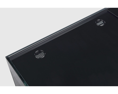 Detailansicht eines Aquariums mit Glasabdeckung und Belüftungsöffnungen